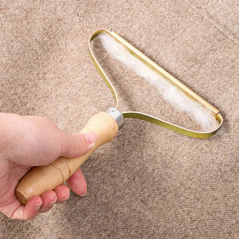 Fabuleuse brosse anti - poils double face en cuivre